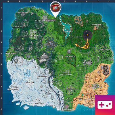 Fortnite: Week 8 Challenge: Dial Pizza Pit on the giant phone east of The Block